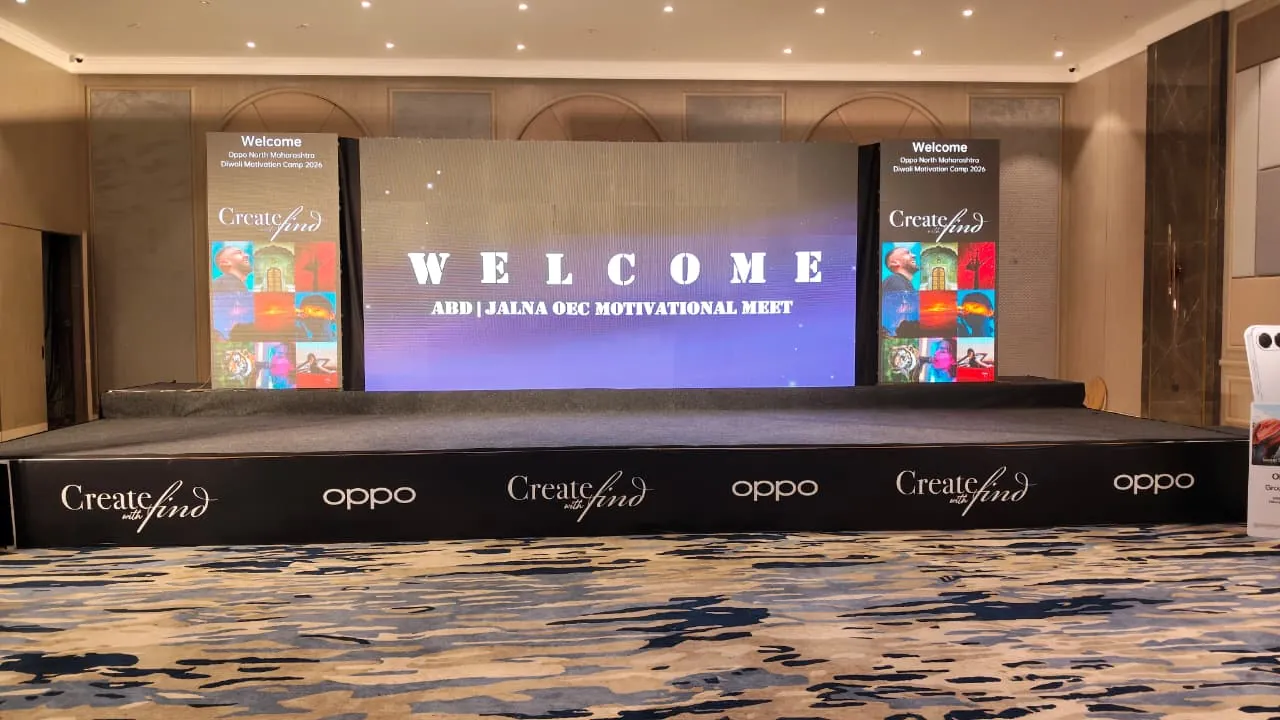 Corporate conference with attendees and stage setup
