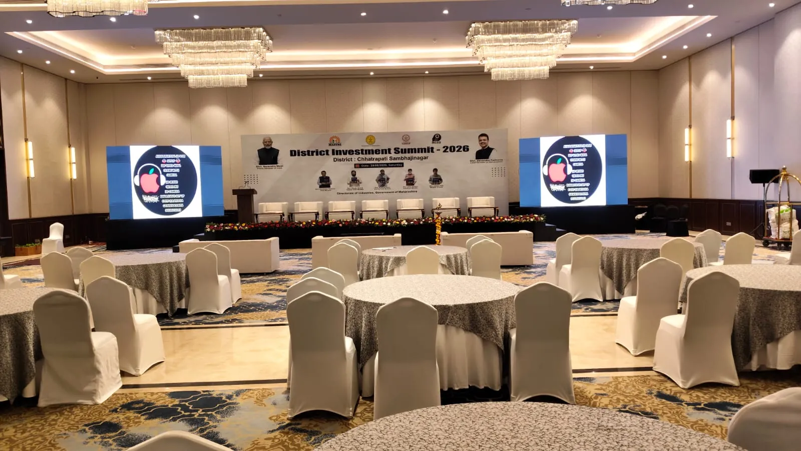Corporate conference with attendees and stage setup
