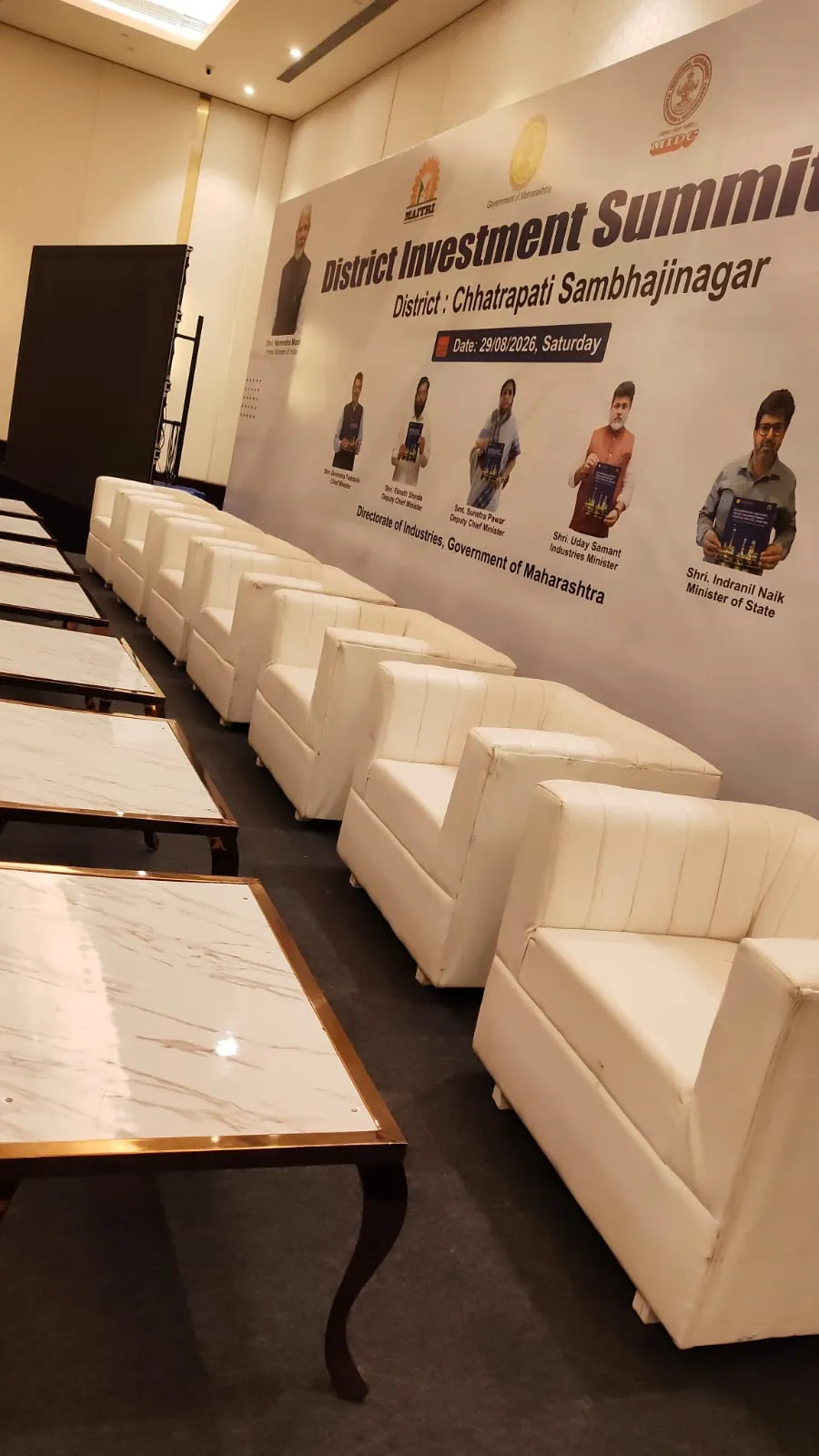 Corporate conference with attendees and stage setup