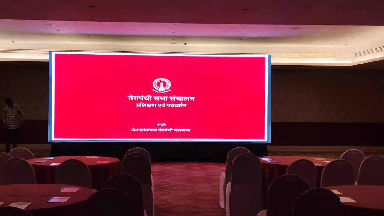 Corporate conference with attendees and stage setup