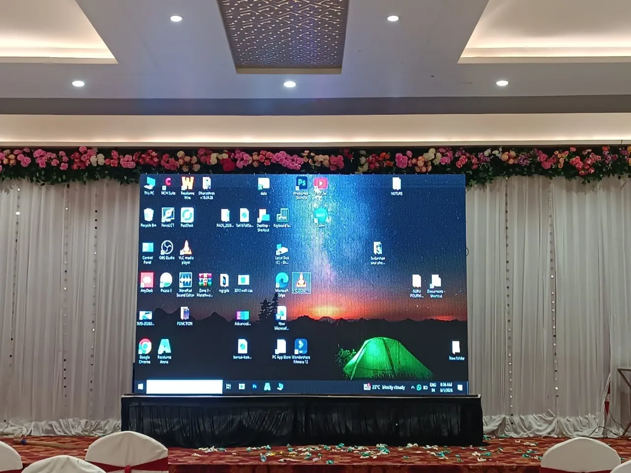 Corporate conference with attendees and stage setup