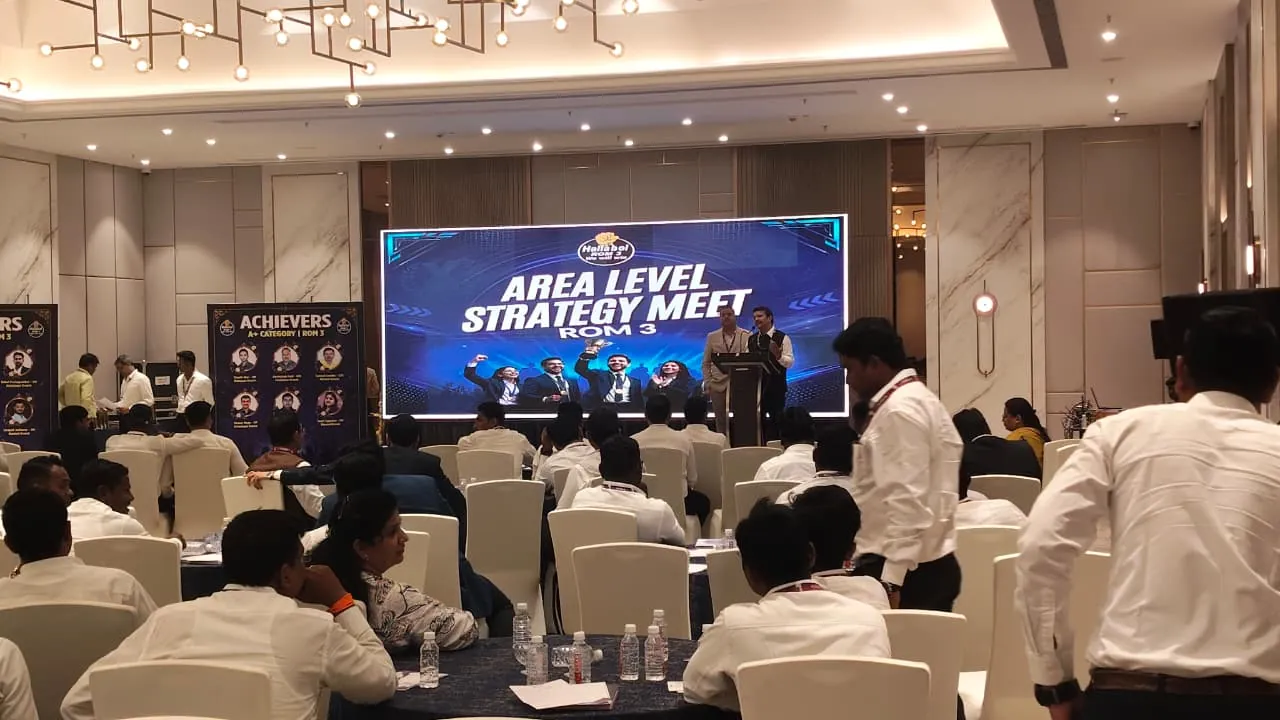 Corporate conference with attendees and stage setup