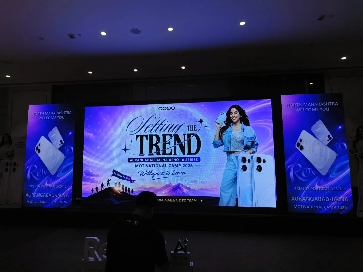 Corporate conference with attendees and stage setup