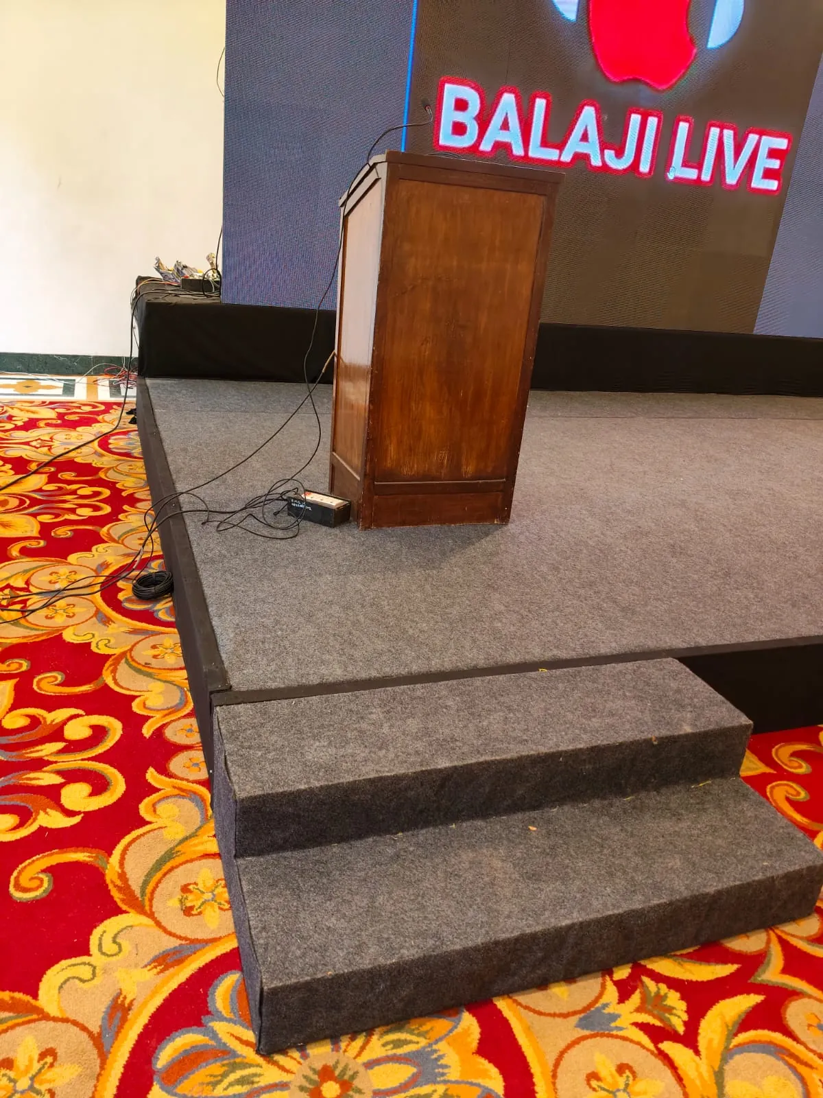 Corporate conference with attendees and stage setup