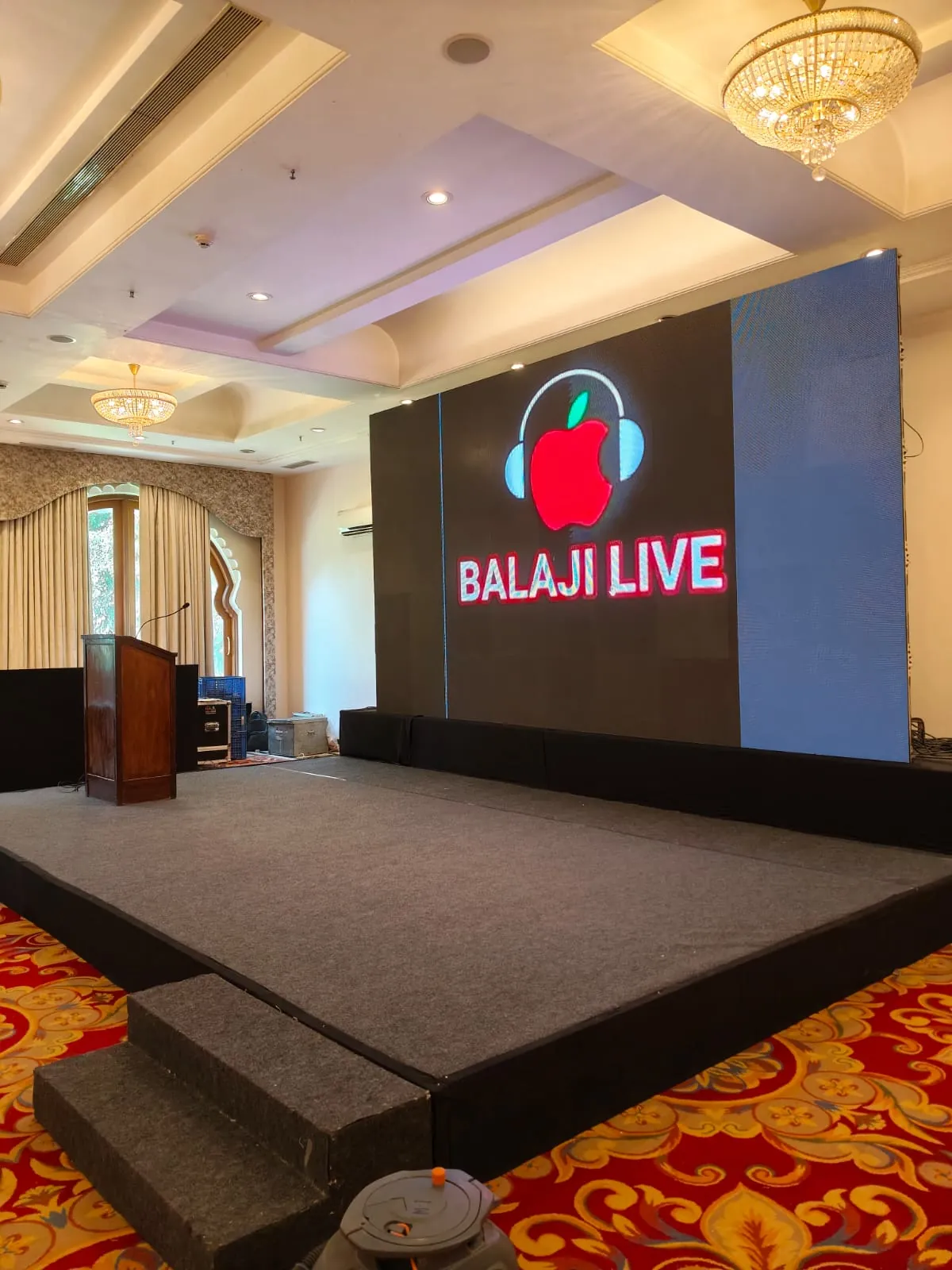 Corporate conference with attendees and stage setup
