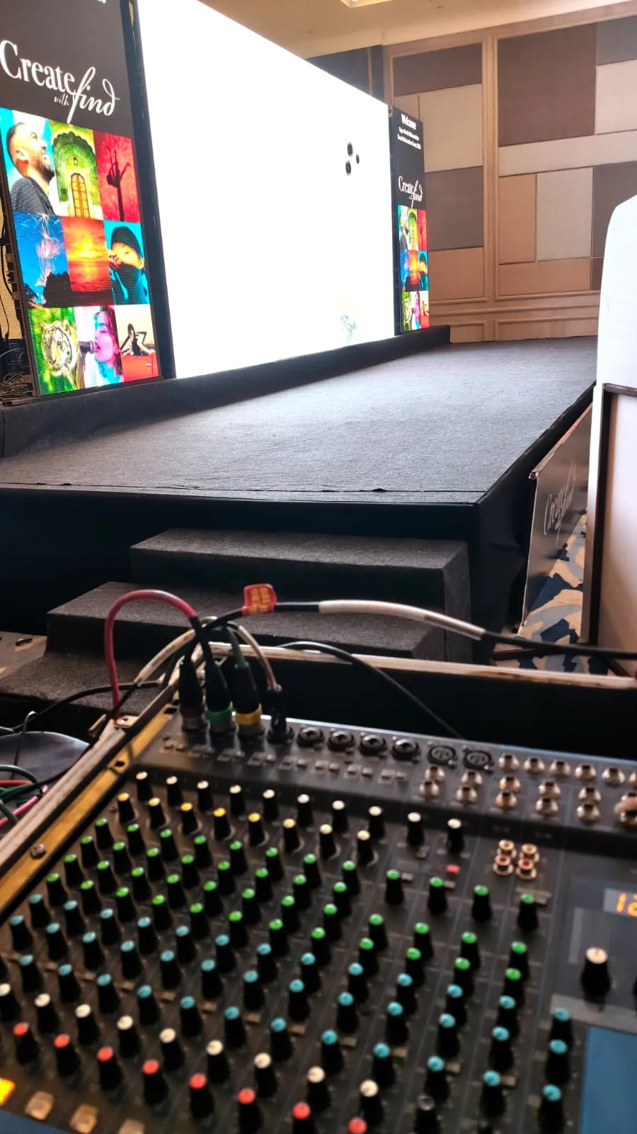 Corporate conference with attendees and stage setup