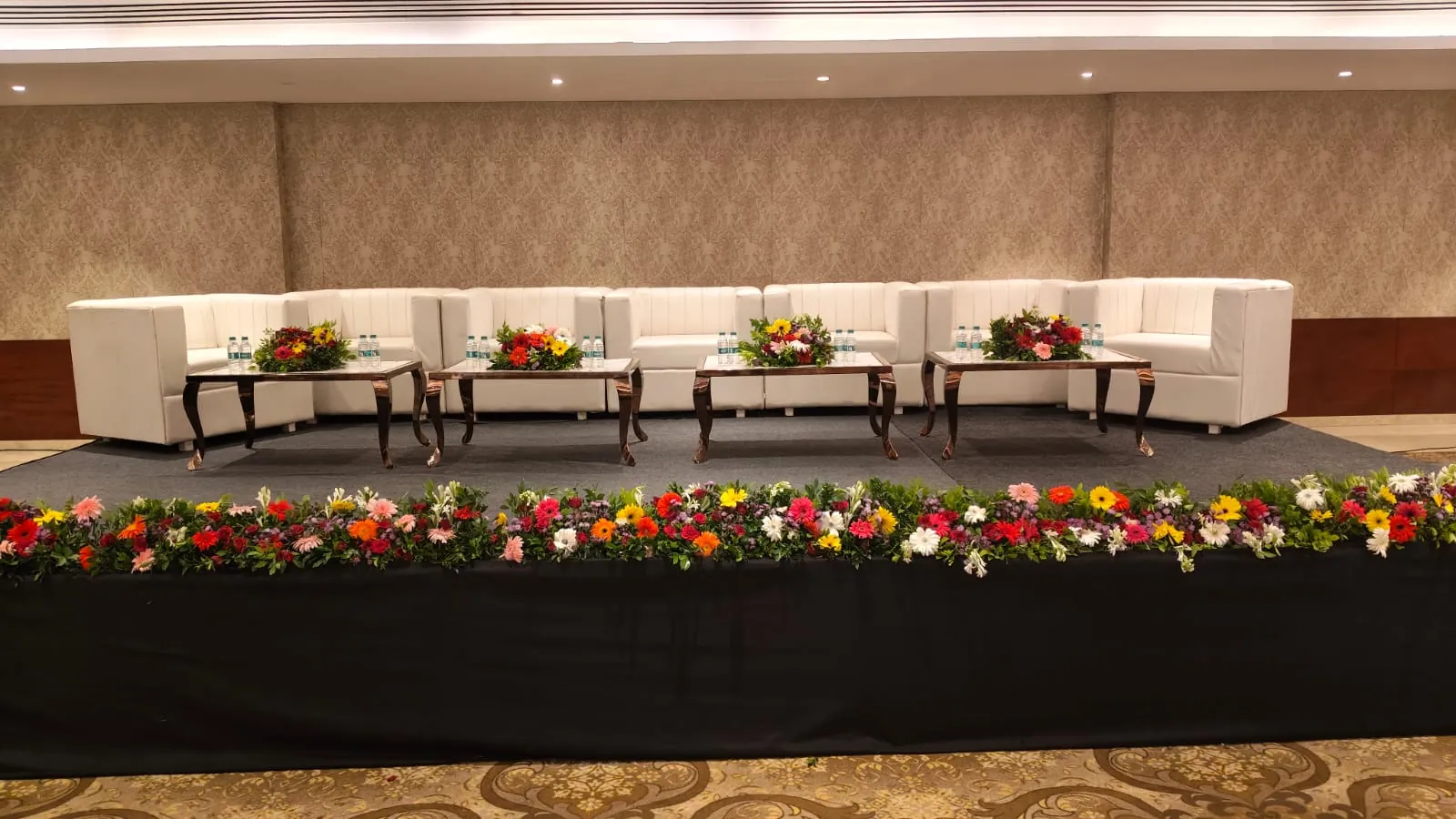 Corporate conference with attendees and stage setup